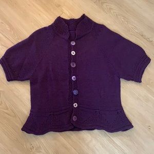 Hand knit sweater with peplum